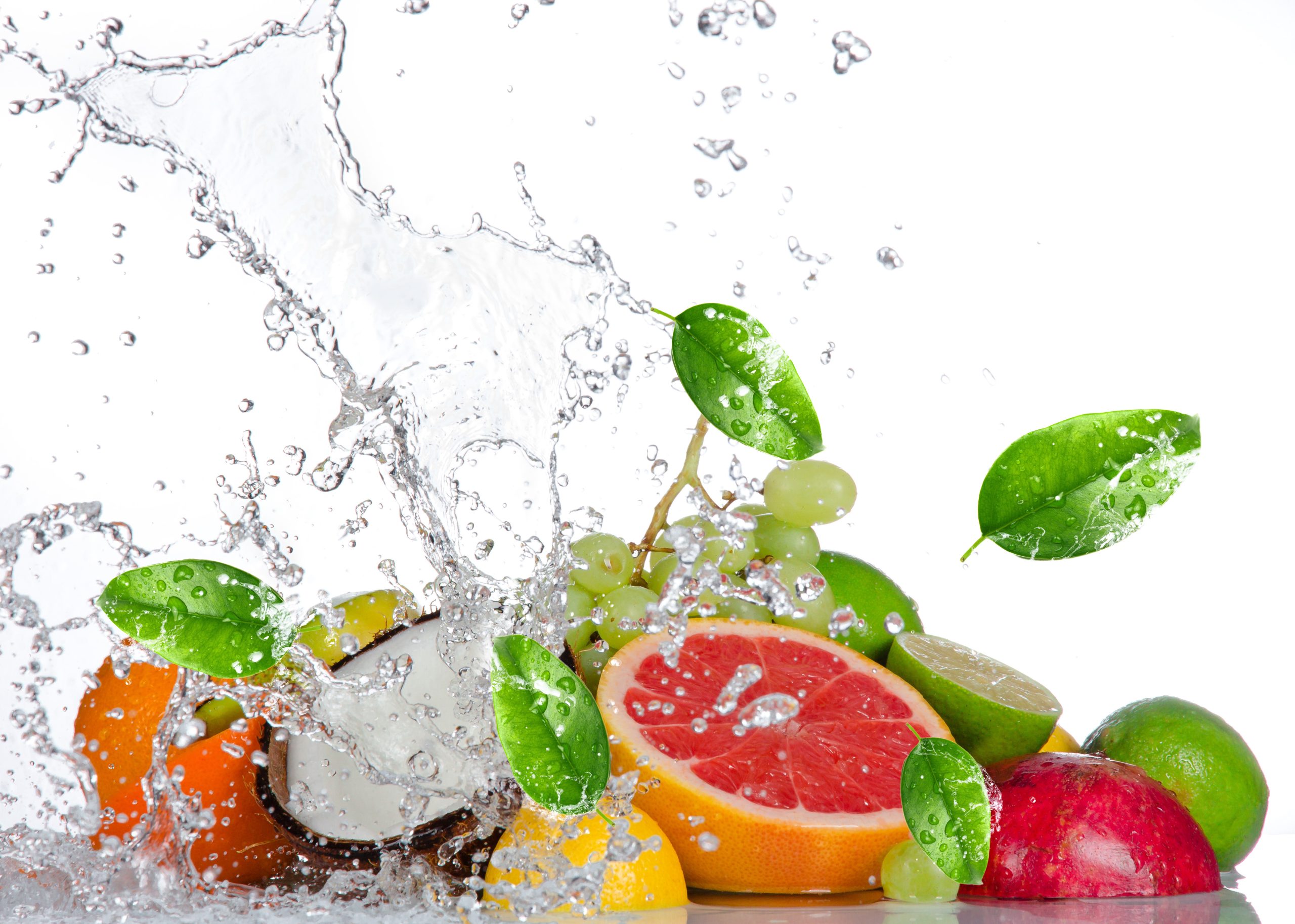 Fresh fruits with water splash isolated on white